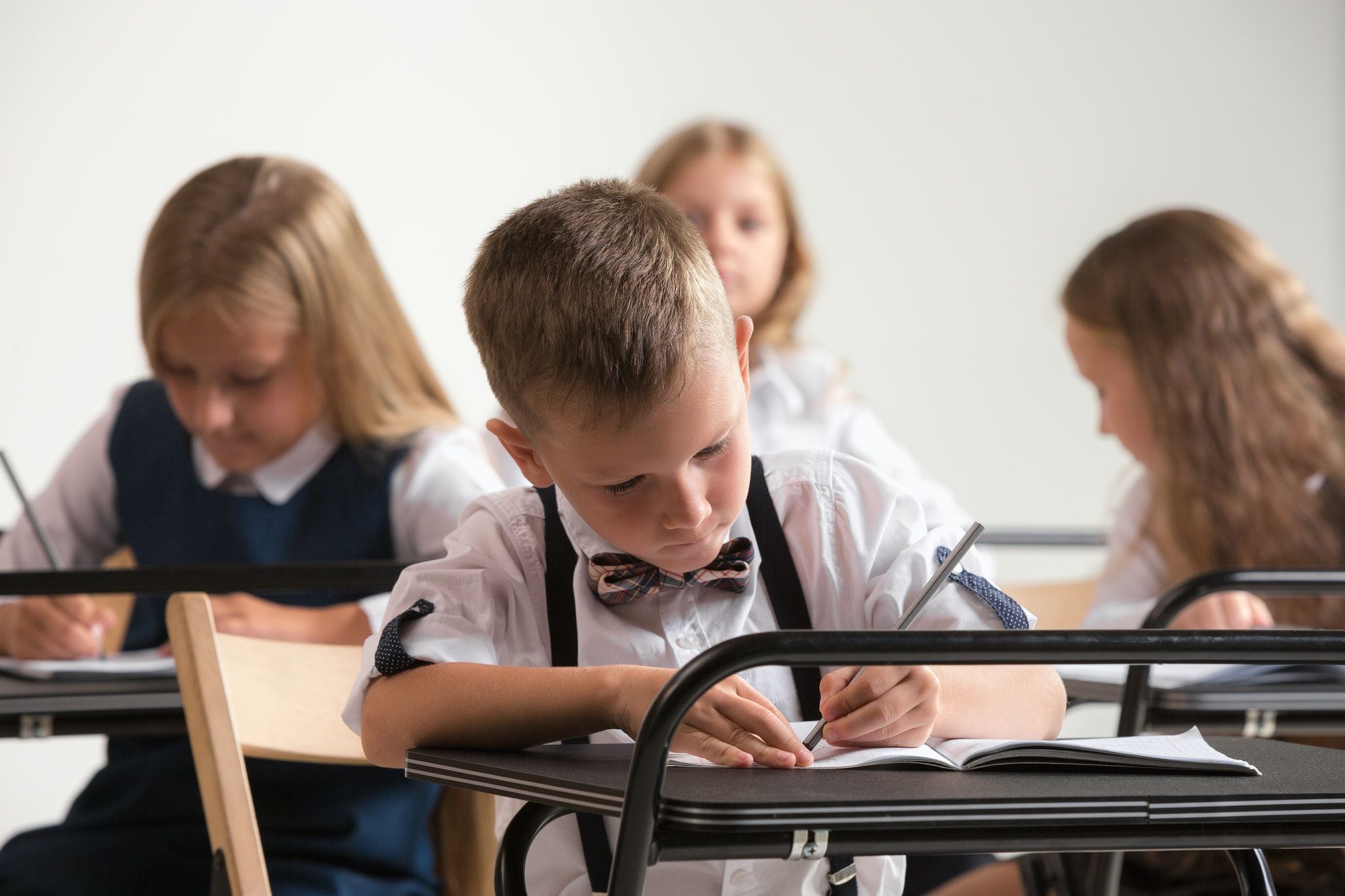 School children in classroom at lesson